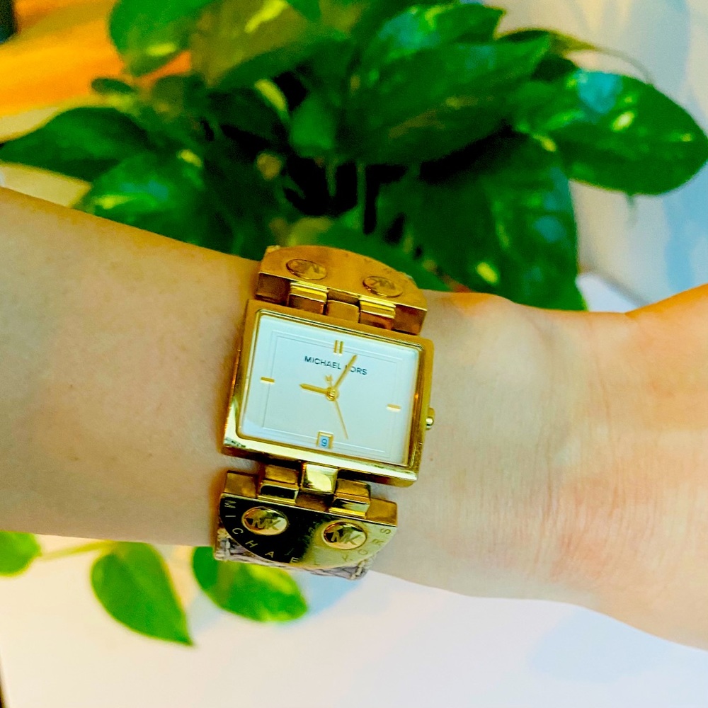 Micheal Kors snake print watch with gold clasps